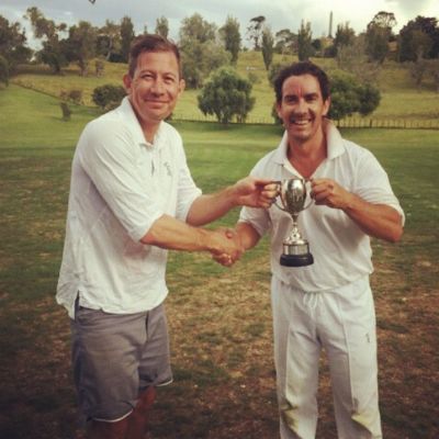 Image of Jhonathan Brugh holding a trophy while he was fifteen.